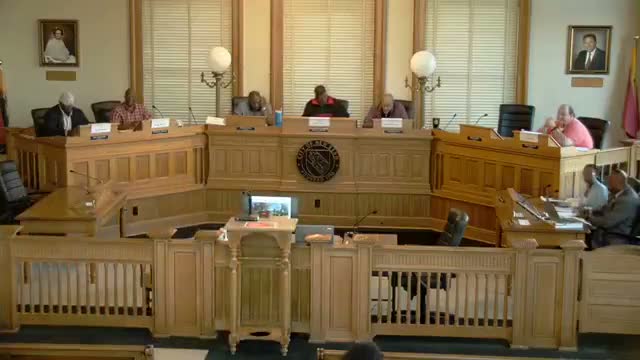 Commission initiates upset‑bid for 606 White Street, approves three sales and hears budget update