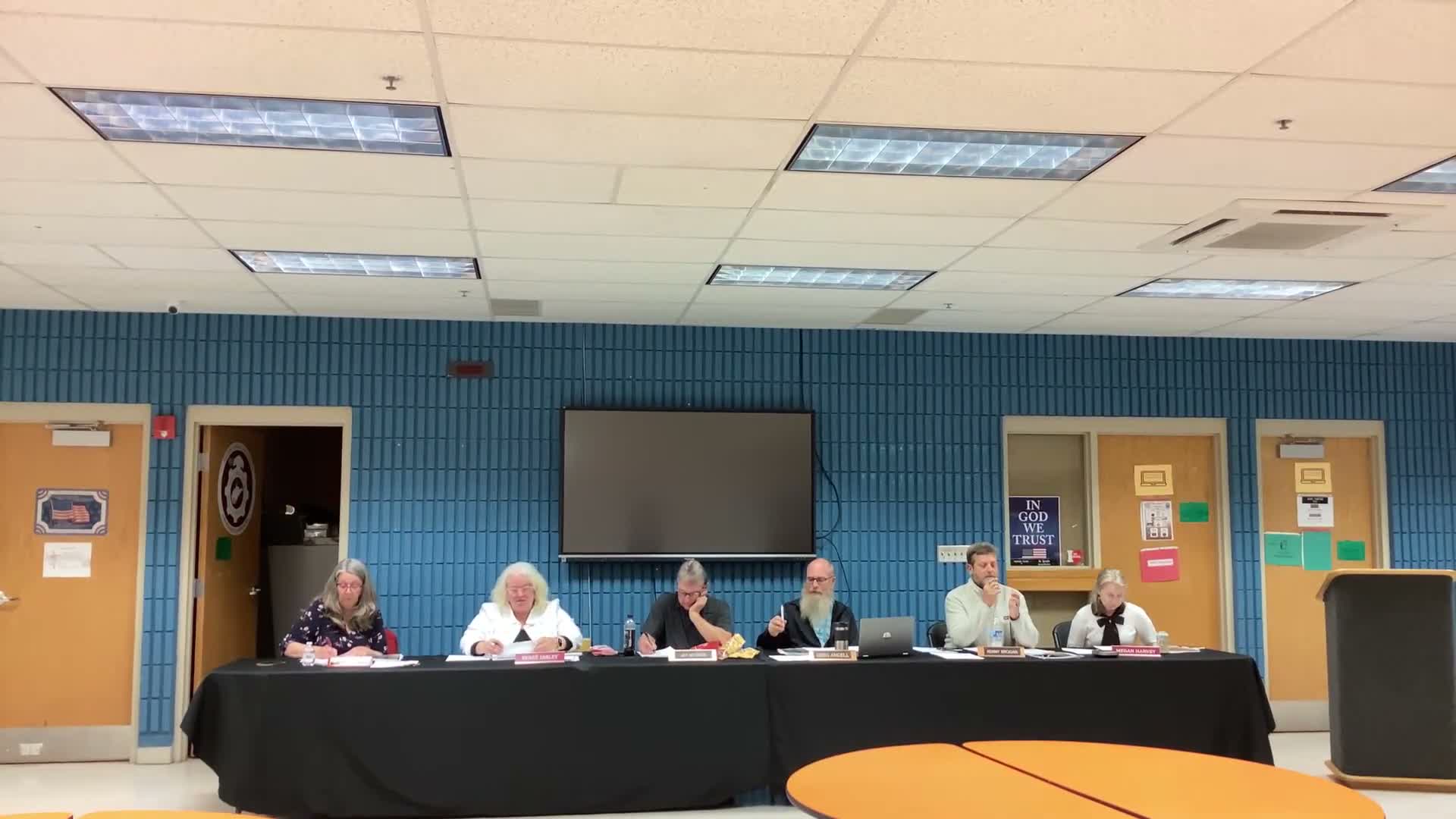 Board postpones decision on relocating central office as members weigh capacity and charter-school rules