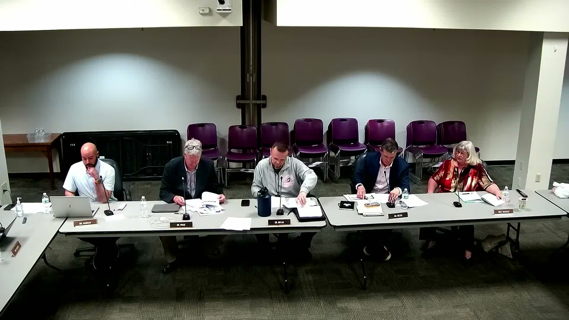 District proposes folding expiring AST agreement into employee handbook, suggests grandfathering and benefit changes