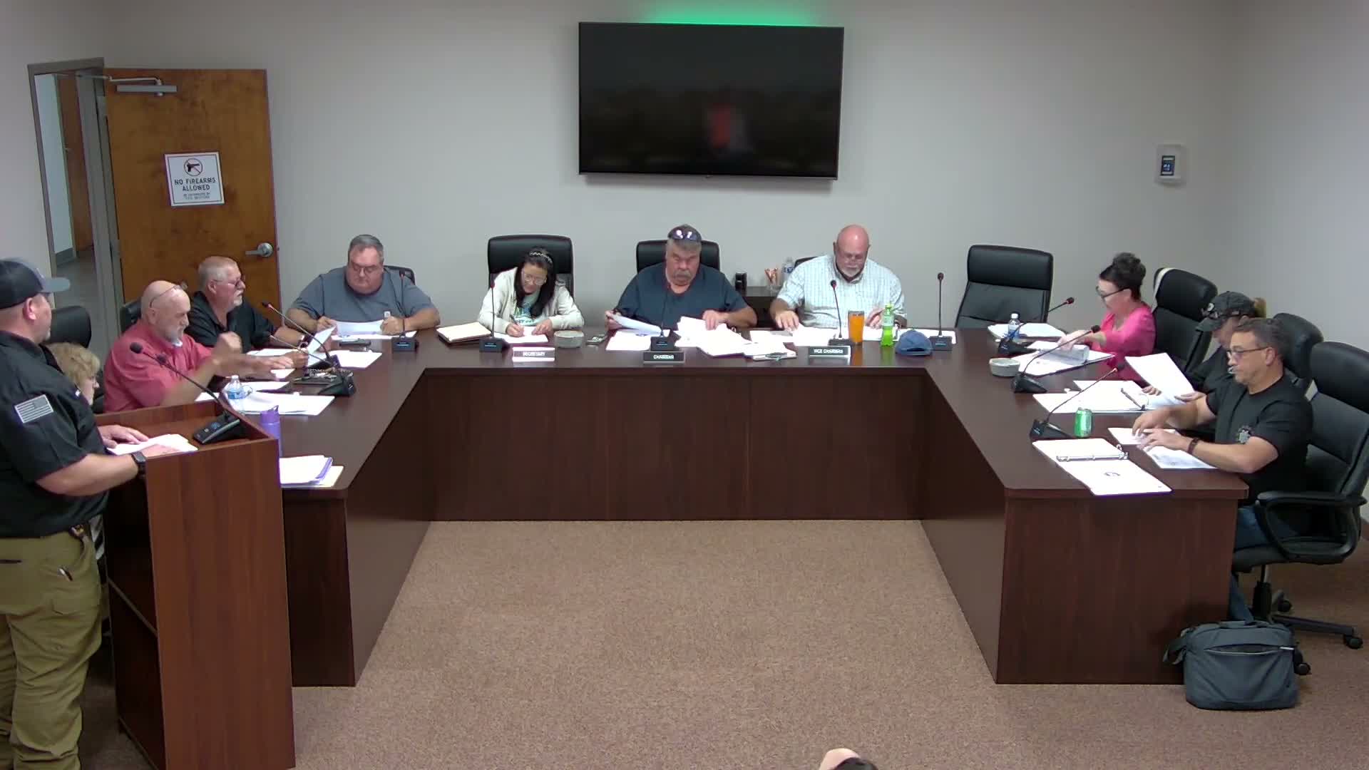Interim EMA director asks for staff pay increases and radio equipment; committee to review director duties